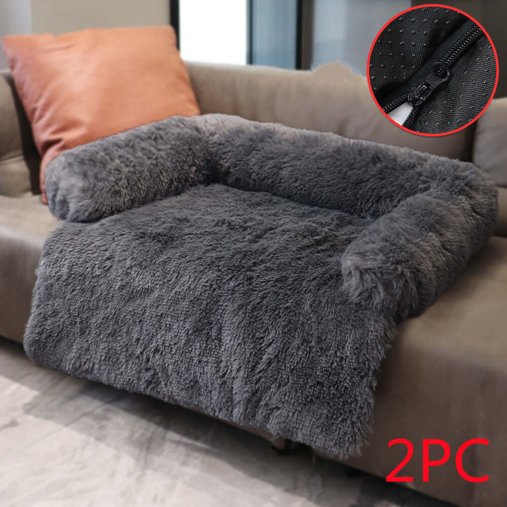 Cozy detachable plush dog bed on a sofa, featuring a washable cover, perfect winter retreat for pets.