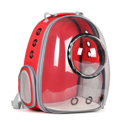 Red pet travel backpack for dogs and cats with clear front and ventilation holes, ideal for comfortable pet outings.